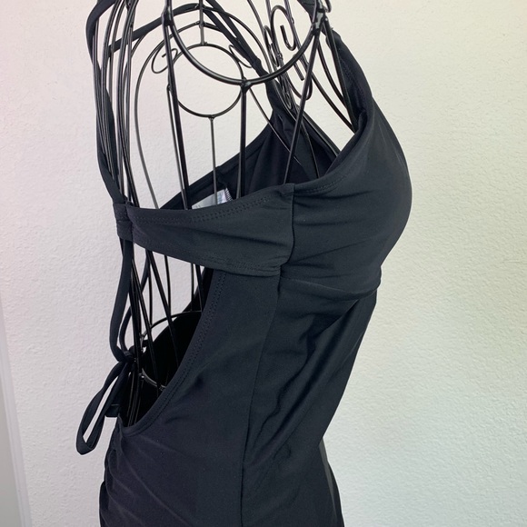 Swimsuit crisscrossed tie straps. Medium(8-10). - Picture 3 of 7